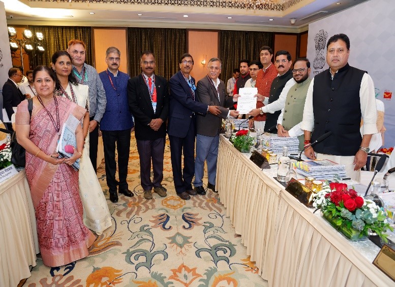 Director General receiving the Certificate from Honourable Chairman and Members of the Committee.